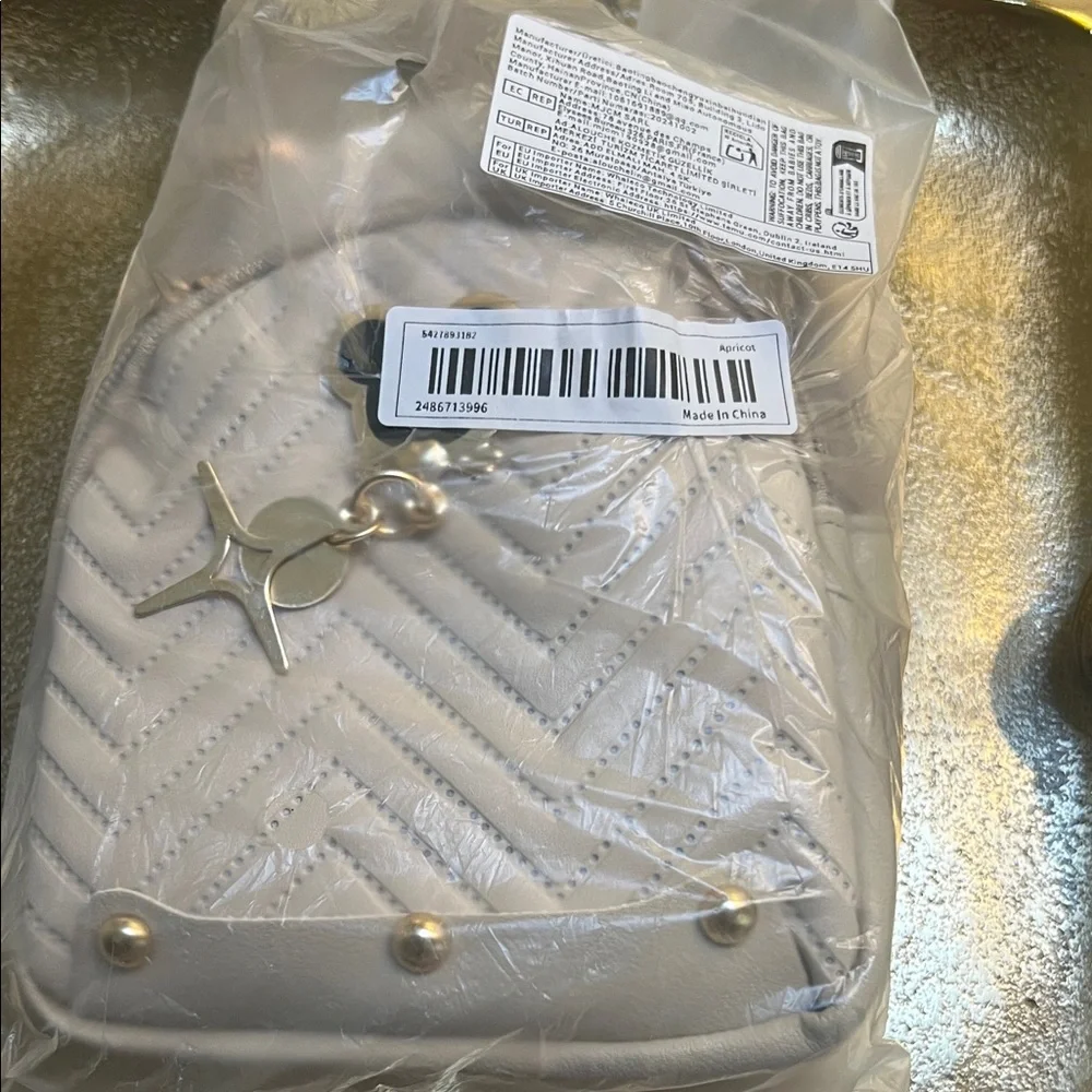 #1345**Stylish Beige Mini Quilted Backpack “47 long” adjustable strap. - Picture 7 of 7